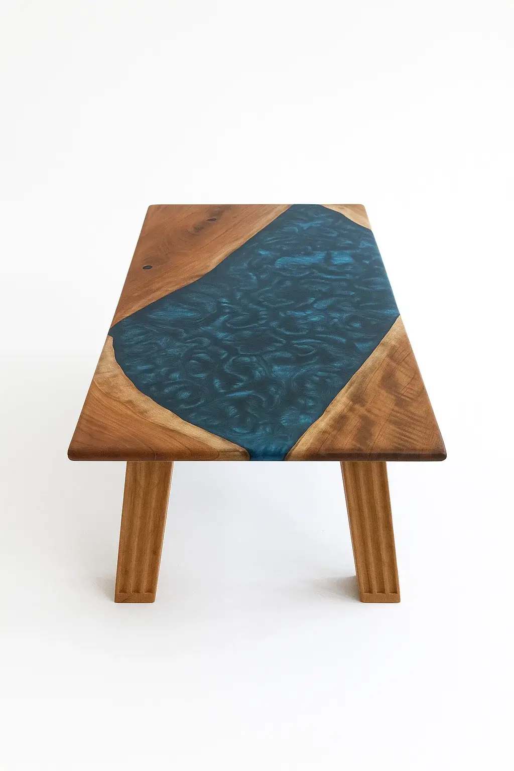 Studio image of handcrafted Cherry wood resin river coffee table with vibrant ocean-blue Macaw resin, set against a white background