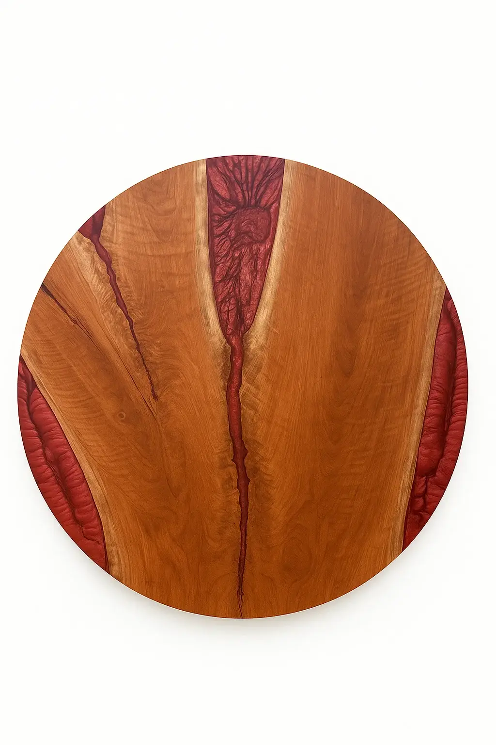 Studio image of round Cherry wood resin river table with rich Merlot red resin accents, handcrafted from natural cherry wood and photographed against a white background