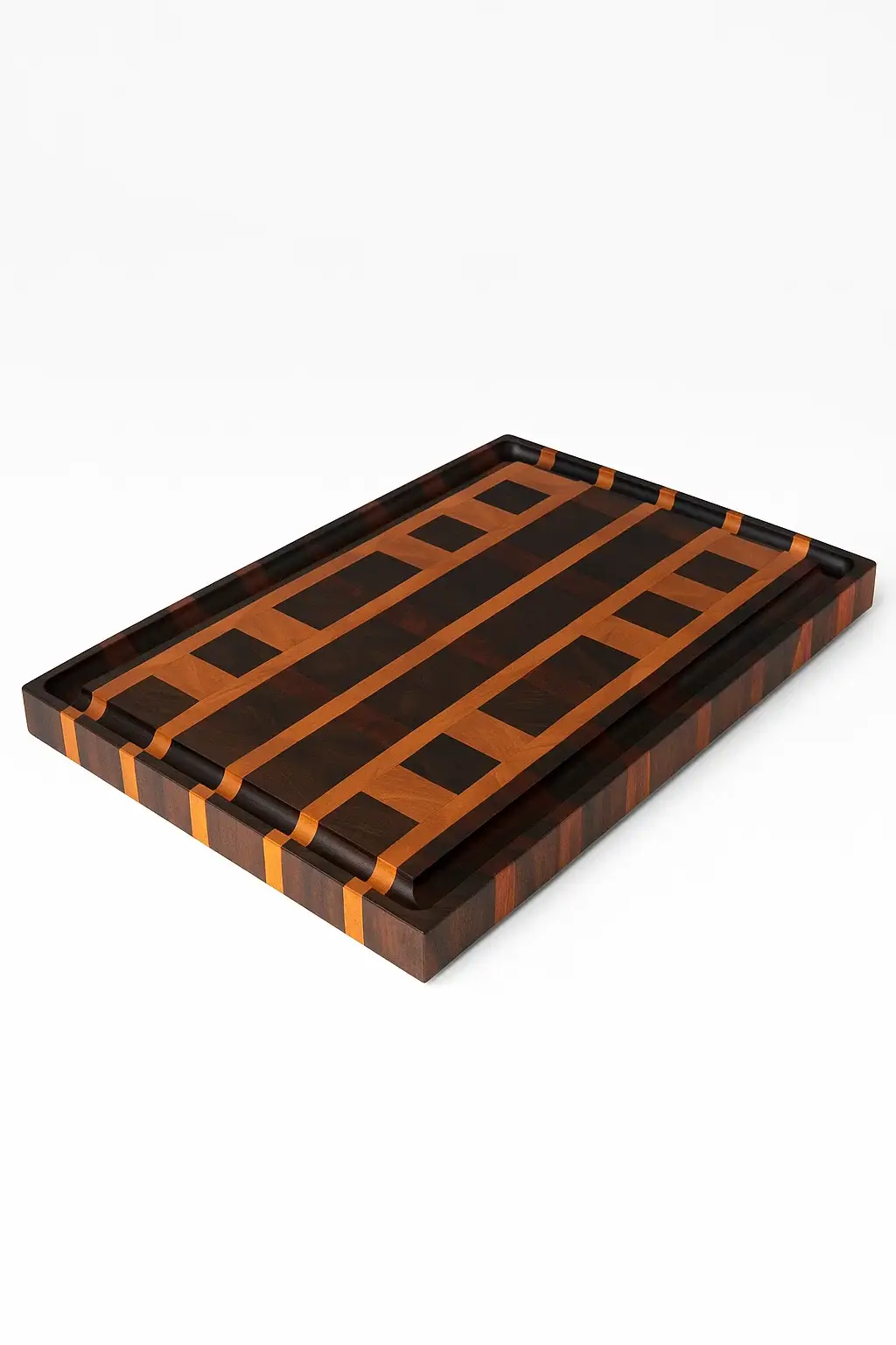 End grain cutting board made from Black Walnut, Cherry, and Bloodwood hardwoods, shown on a white background with rich contrasting tones and juice groove design