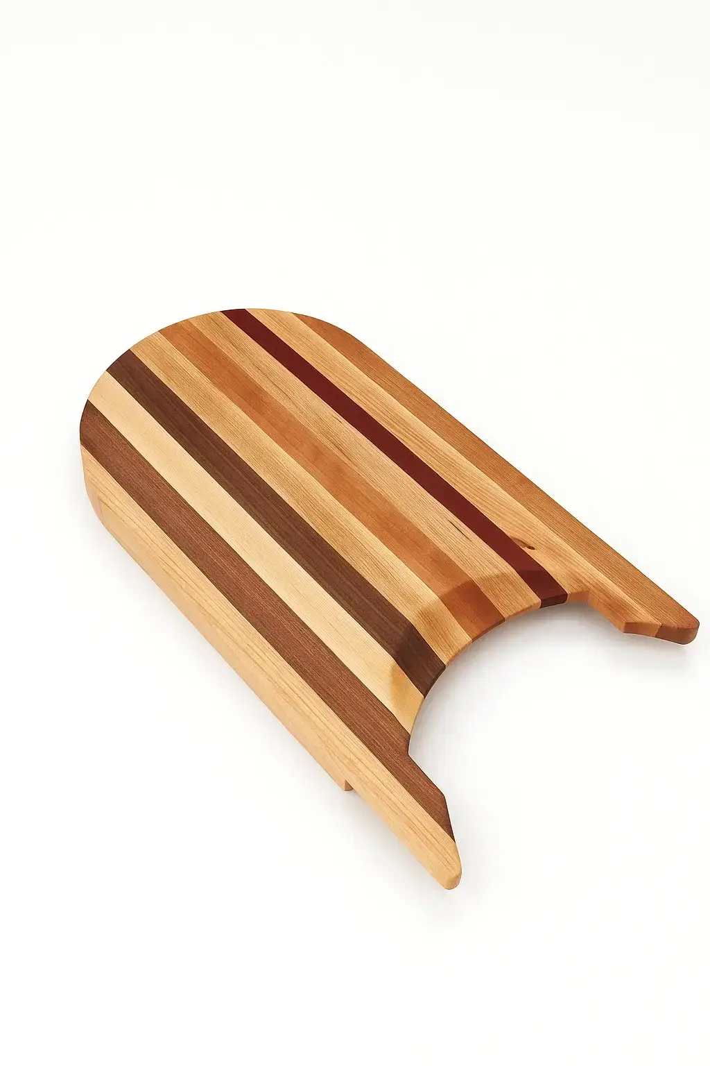 Handcrafted sled cutting board made from Maple, Cherry, Bloodwood, and Mahogany wood, displayed on a white background from an alternate angled view